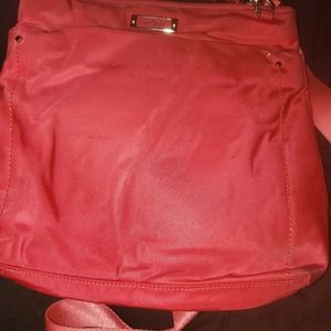 RED TUMI CAPRI VOYAGER CROSSBODY